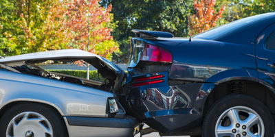 Two cars after a rear end collision.